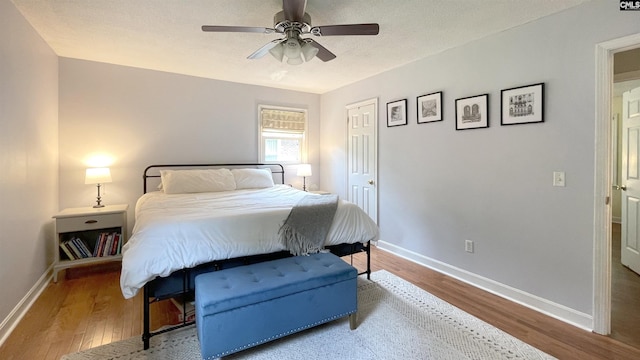 6965 Shelley Rd, Columbia, SC 29209 - bedroom with wood finished floors and a ceiling fan