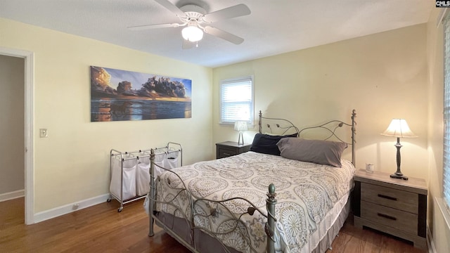 6965 Shelley Rd, Columbia, SC 29209 - bedroom with wood finished floors and ceiling fan