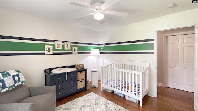 6965 Shelley Rd, Columbia, SC 29209 - bedroom featuring wood finished floors, a crib, and ceiling fan