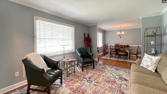 6965 Shelley Rd, Columbia, SC 29209 - living area with a chandelier, wood finished floors, crown molding, and a textured ceiling