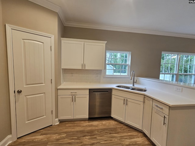 2101 Durham Dr, West Columbia, SC 29170 - kitchen with stainless steel dishwasher, crown molding, plenty of natural light, dark wood-style floors, and white cabinetry