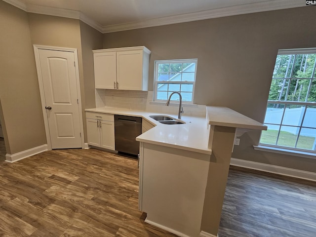 2101 Durham Dr, West Columbia, SC 29170 - kitchen featuring stainless steel dishwasher, dark wood-style flooring, white cabinetry, light countertops, and backsplash
