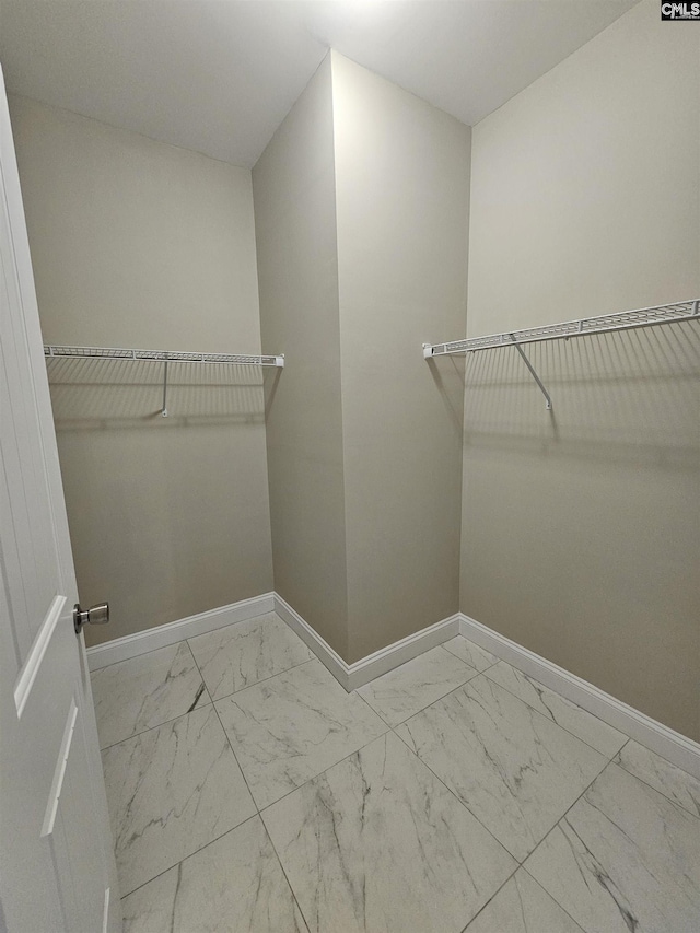2101 Durham Dr, West Columbia, SC 29170 - spacious closet featuring marble look tiles