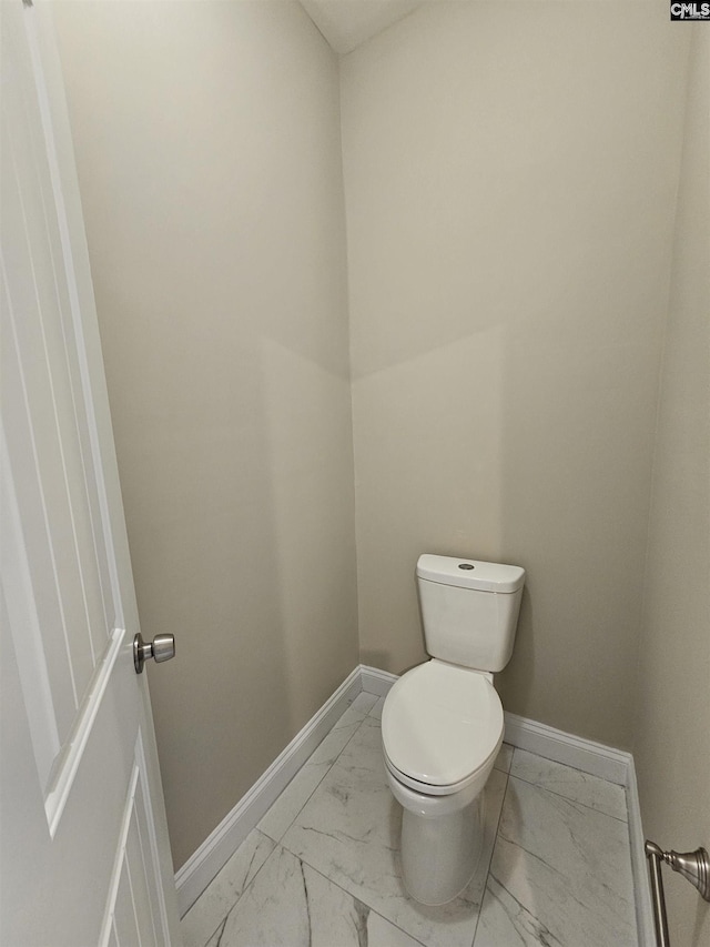 2101 Durham Dr, West Columbia, SC 29170 - bathroom featuring marble look tiles and baseboards