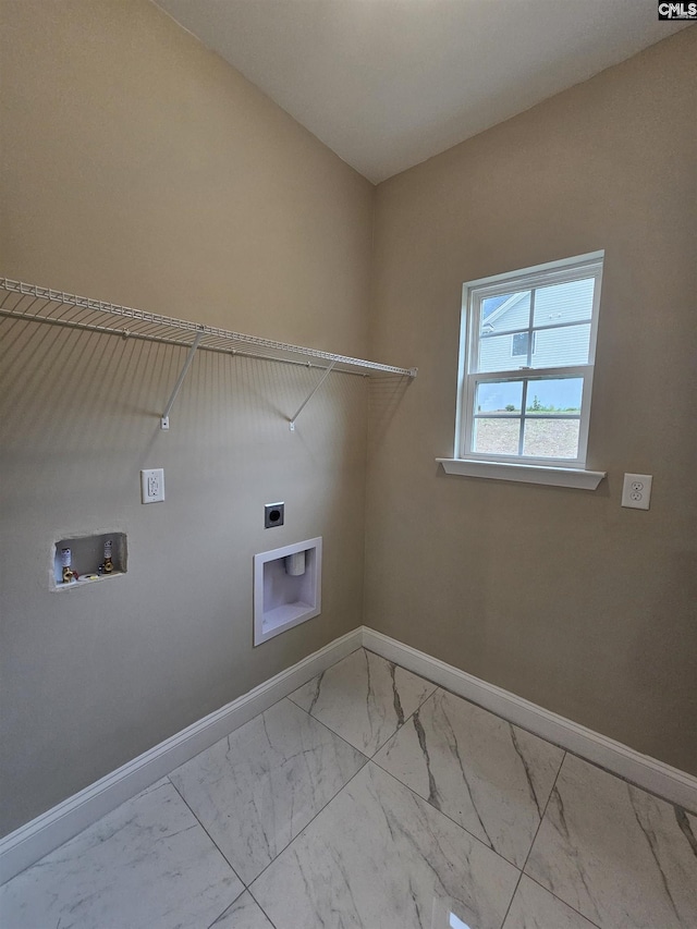 2101 Durham Dr, West Columbia, SC 29170 - laundry area with electric dryer hookup, marble look tile flooring, and hookup for a washing machine