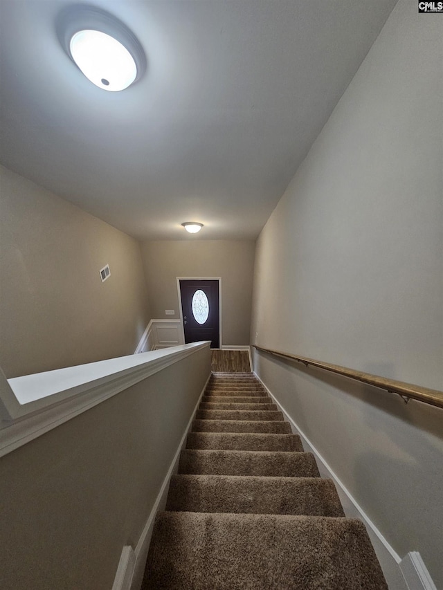 2101 Durham Dr, West Columbia, SC 29170 - stairway with carpet flooring and baseboards