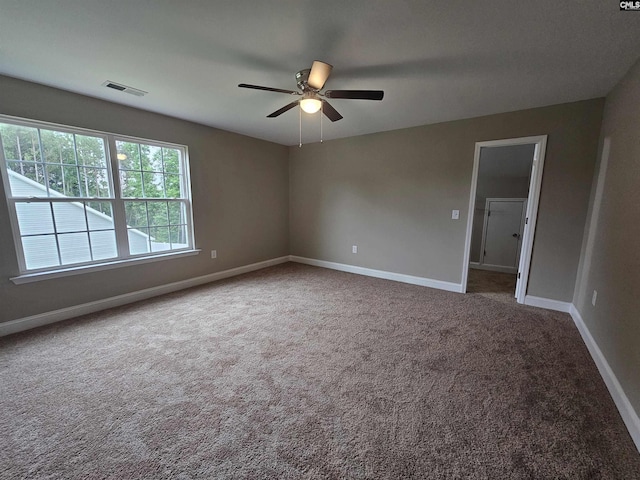 2101 Durham Dr, West Columbia, SC 29170 - carpeted empty room featuring a ceiling fan and baseboards