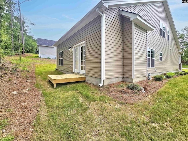 2101 Durham Dr, West Columbia, SC 29170 - view of property exterior with french doors, a yard, and a deck