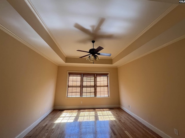 218 Scarborough Way, Lexington, SC 29072 - spare room with a raised ceiling, wood finished floors, ornamental molding, and ceiling fan