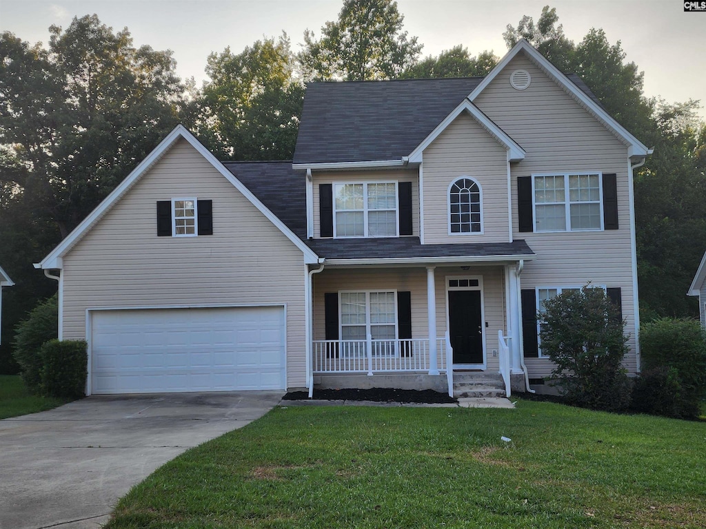 142 Heises Pond Way, Columbia, SC 29229 - traditional-style home featuring a porch, concrete driveway, a garage, and a front lawn
