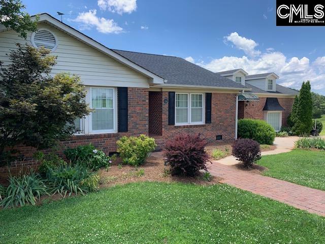 223 Cammack Rd, Winnsboro, SC 29180 - view of front of home with brick siding and a front lawn