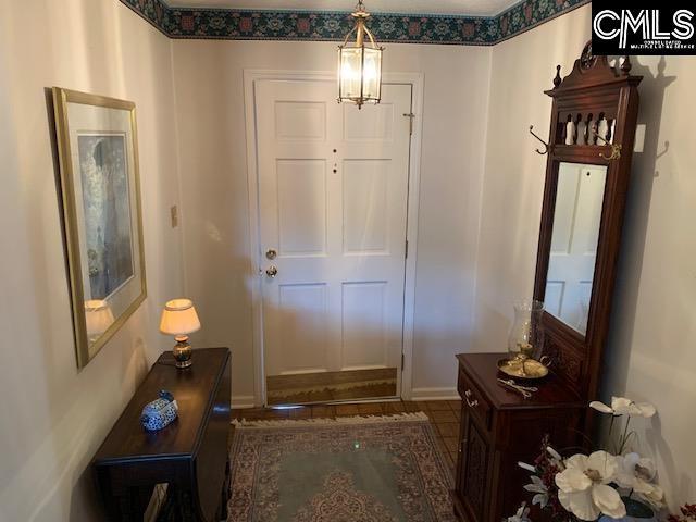 223 Cammack Rd, Winnsboro, SC 29180 - doorway to outside featuring baseboards