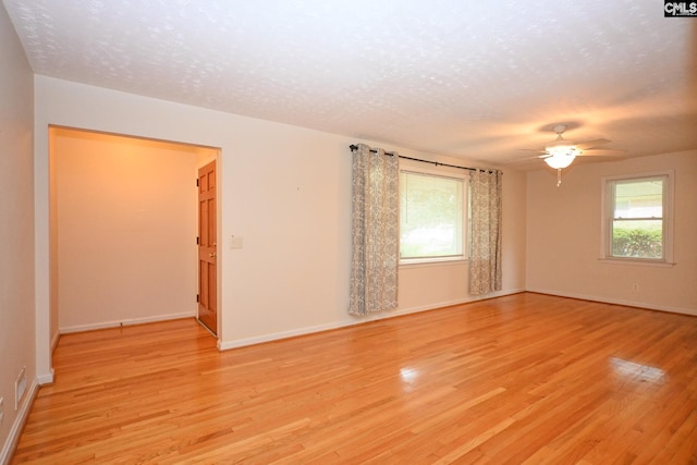 1120 Garden Ave, Cayce, SC 29033 - unfurnished room with ceiling fan, light wood-type flooring, healthy amount of natural light, and a textured ceiling