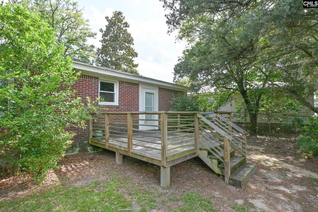 1120 Garden Ave, Cayce, SC 29033 - rear view of property with brick siding and a wooden deck