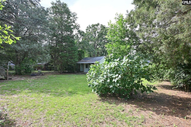 1120 Garden Ave, Cayce, SC 29033 - view of grassy yard featuring an outdoor structure