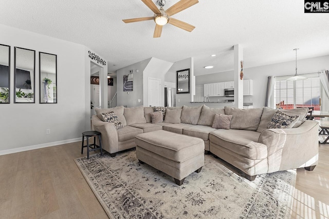218 Founders Ridge Rd, Columbia, SC 29229 - living room featuring a ceiling fan, light wood-style flooring, and a textured ceiling