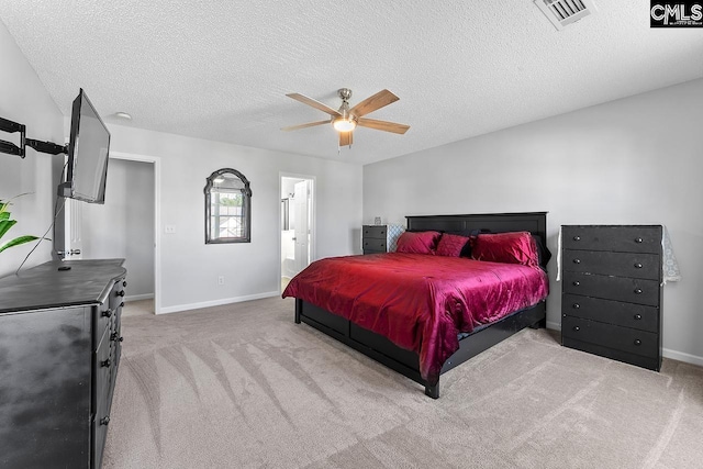 218 Founders Ridge Rd, Columbia, SC 29229 - bedroom with carpet flooring, a textured ceiling, a ceiling fan, and connected bathroom