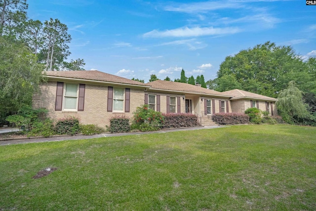 2432 Bermuda Hills Rd, Columbia, SC 29223 - ranch-style house with brick siding, a front yard, and a chimney