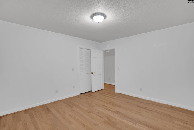 2432 Bermuda Hills Rd, Columbia, SC 29223 - empty room featuring light wood finished floors, a textured ceiling, and ornamental molding