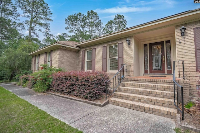 2432 Bermuda Hills Rd, Columbia, SC 29223 - view of exterior entry featuring brick siding
