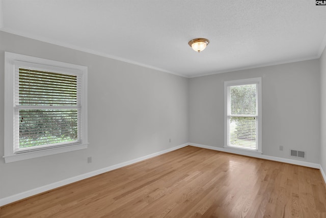 2432 Bermuda Hills Rd, Columbia, SC 29223 - spare room featuring healthy amount of natural light, wood finished floors, and ornamental molding