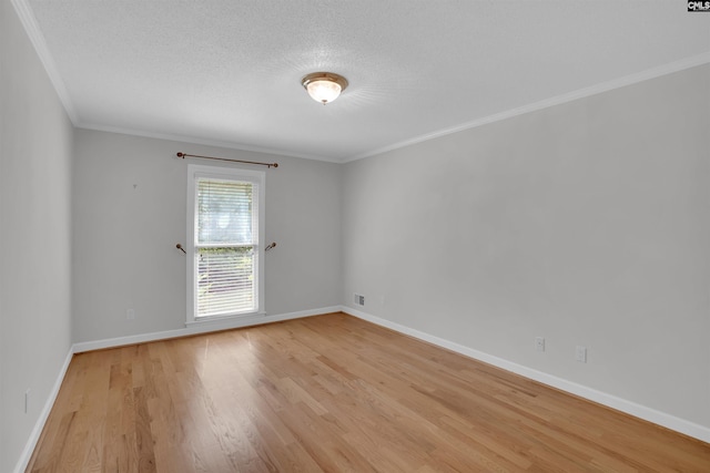 2432 Bermuda Hills Rd, Columbia, SC 29223 - empty room featuring light wood-type flooring, ornamental molding, and a textured ceiling