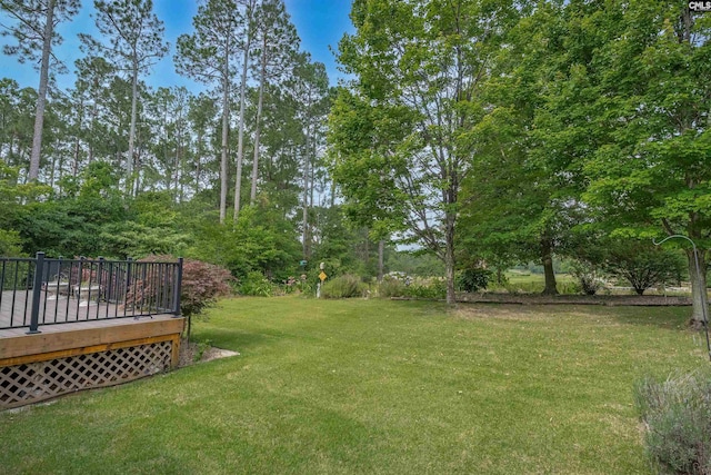 2432 Bermuda Hills Rd, Columbia, SC 29223 - view of green lawn with a wooden deck