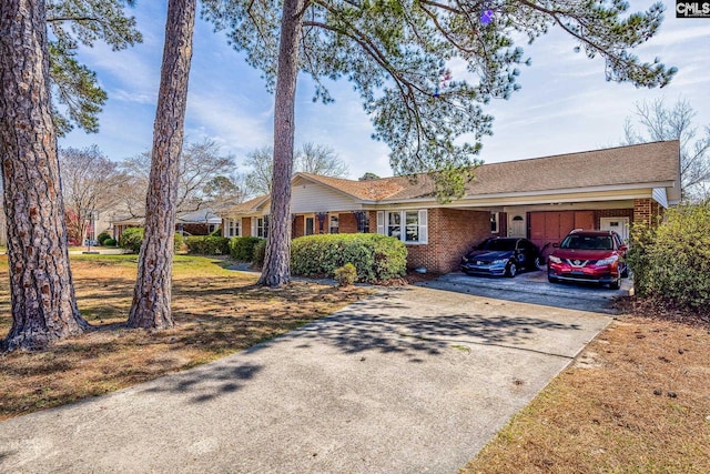 289 King Charles Rd, Columbia, SC 29209 - ranch-style home featuring driveway, brick siding, and a carport