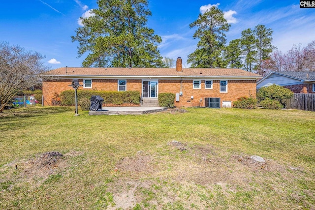 289 King Charles Rd, Columbia, SC 29209 - back of house with a patio, a chimney, and brick siding