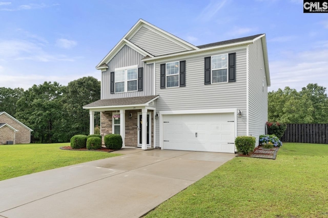 34 Riesling Ct, Lugoff, SC 29078 - view of front of property featuring driveway, a garage, board and batten siding, and stone siding