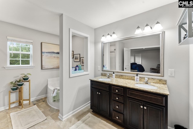 34 Riesling Ct, Lugoff, SC 29078 - bathroom featuring double vanity, a bath, and ensuite bathroom