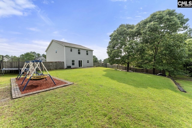 34 Riesling Ct, Lugoff, SC 29078 - fenced backyard with a trampoline and a playground