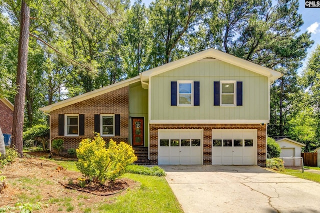 330 Grantham Rd, Irmo, SC 29063 - tri-level home with an attached garage, driveway, and brick siding