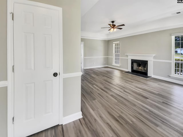 1524 Highway Church Rd, Elgin, SC 29045 - unfurnished living room with ceiling fan, wood finished floors, a fireplace, and crown molding