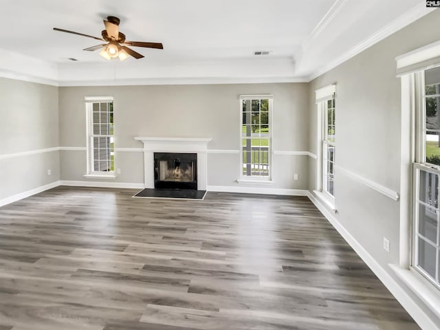 1524 Highway Church Rd, Elgin, SC 29045 - unfurnished living room with healthy amount of natural light, a glass covered fireplace, wood finished floors, and ornamental molding