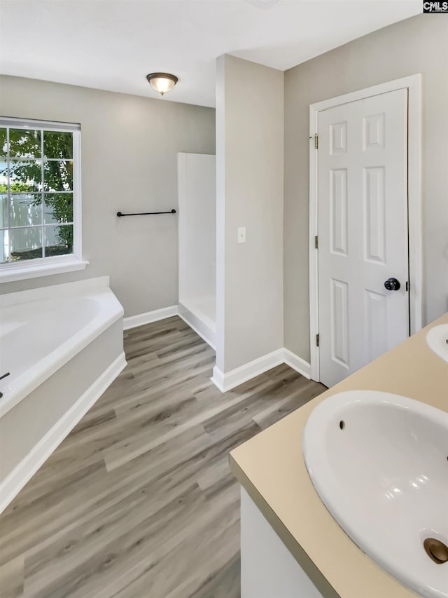1524 Highway Church Rd, Elgin, SC 29045 - full bathroom featuring a bath, double vanity, and wood finished floors