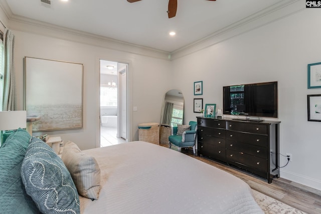 6150 Crabtree Rd, Columbia, SC 29206 - bedroom featuring arched walkways, wood finished floors, ornamental molding, connected bathroom, and a ceiling fan