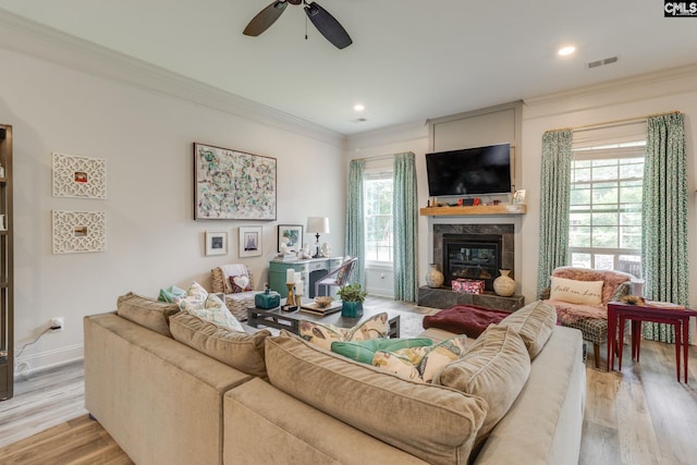 6150 Crabtree Rd, Columbia, SC 29206 - living room featuring ceiling fan, crown molding, a high end fireplace, light wood-style floors, and recessed lighting
