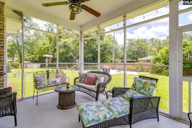 6150 Crabtree Rd, Columbia, SC 29206 - sunroom / solarium featuring ceiling fan, an outdoor living space, and view of scattered trees