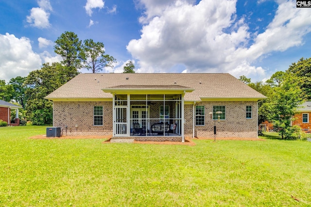 6150 Crabtree Rd, Columbia, SC 29206 - rear view of property featuring a sunroom, a lawn, and brick siding
