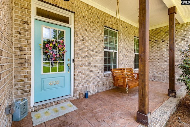 6150 Crabtree Rd, Columbia, SC 29206 - property entrance with covered porch and brick siding