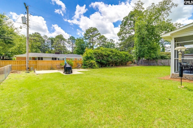 6150 Crabtree Rd, Columbia, SC 29206 - fenced backyard featuring a patio area