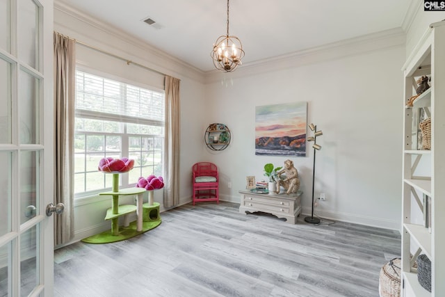 6150 Crabtree Rd, Columbia, SC 29206 - living area with ornamental molding, light wood finished floors, a chandelier, and french doors