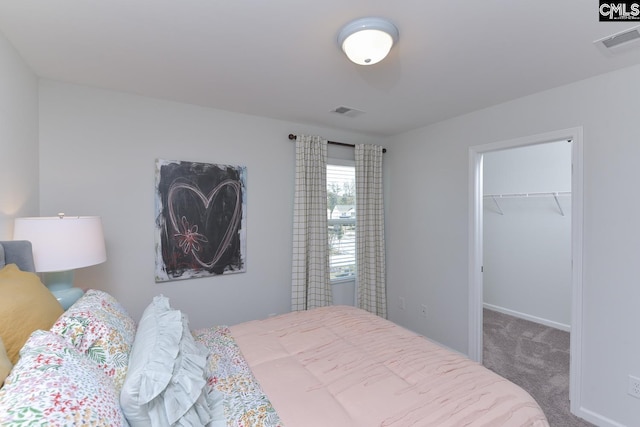 15 Ozark Dr, Columbia, SC 29223 - bedroom with carpet flooring, a spacious closet, and a closet