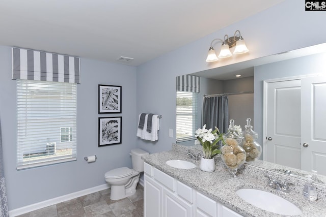 15 Ozark Dr, Columbia, SC 29223 - bathroom with double vanity and a shower with curtain