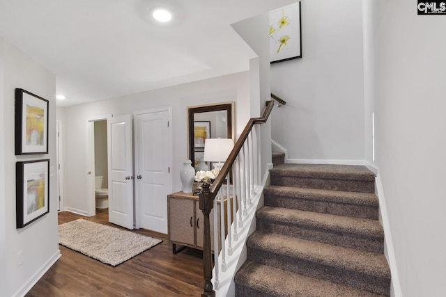 15 Ozark Dr, Columbia, SC 29223 - stairway with wood finished floors and recessed lighting