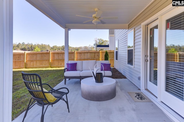 15 Ozark Dr, Columbia, SC 29223 - fenced backyard with a patio, an outdoor hangout area, and a ceiling fan