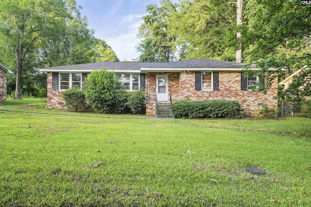 227 Latonea Dr, Columbia, SC 29210 - ranch-style home with a front yard and brick siding