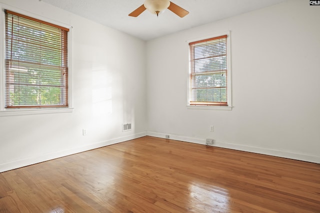 227 Latonea Dr, Columbia, SC 29210 - spare room featuring wood finished floors and a ceiling fan