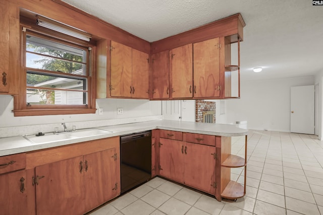 227 Latonea Dr, Columbia, SC 29210 - kitchen featuring dishwasher, light countertops, a peninsula, light tile patterned floors, and a textured ceiling